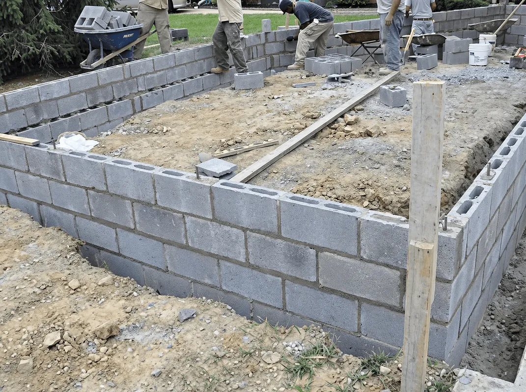Professionals building a foundation with blocks in New Orleans, LA