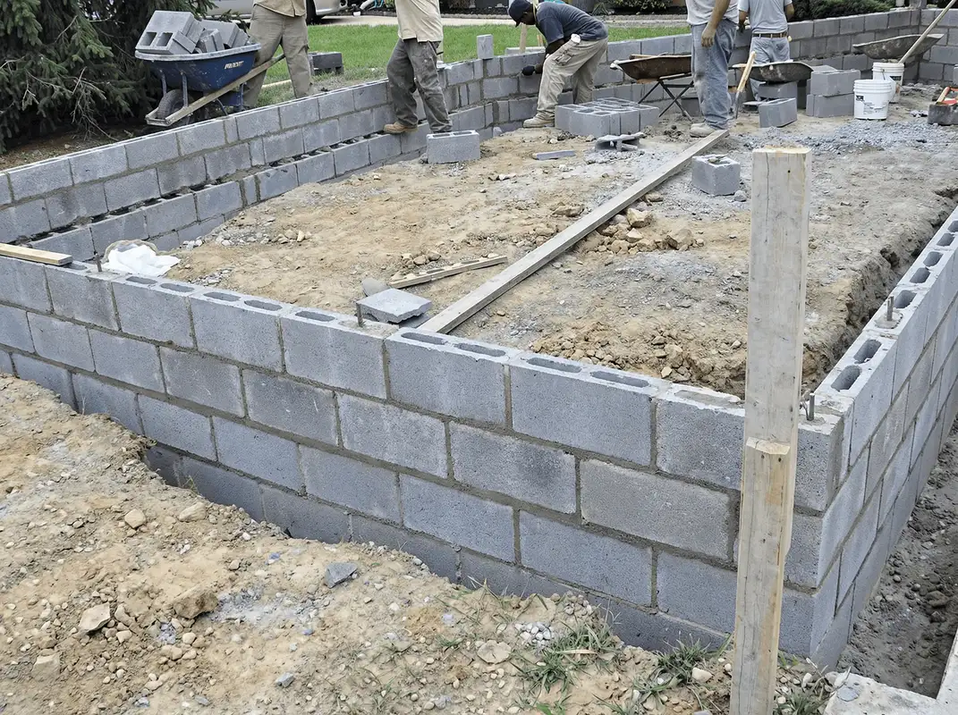 Professionals building a foundation with blocks in New Orleans, LA