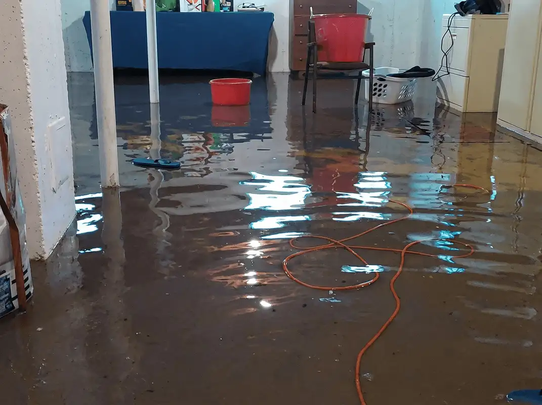 Basement with boiler, cabinets and washing machine completely flooded in New Orleans, LA
